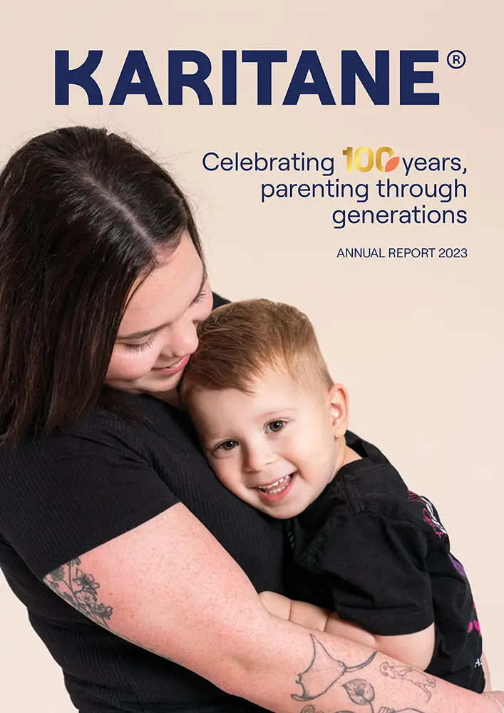 photo of a woman holding a baby boy for a cover of Karitane 100th years annual report