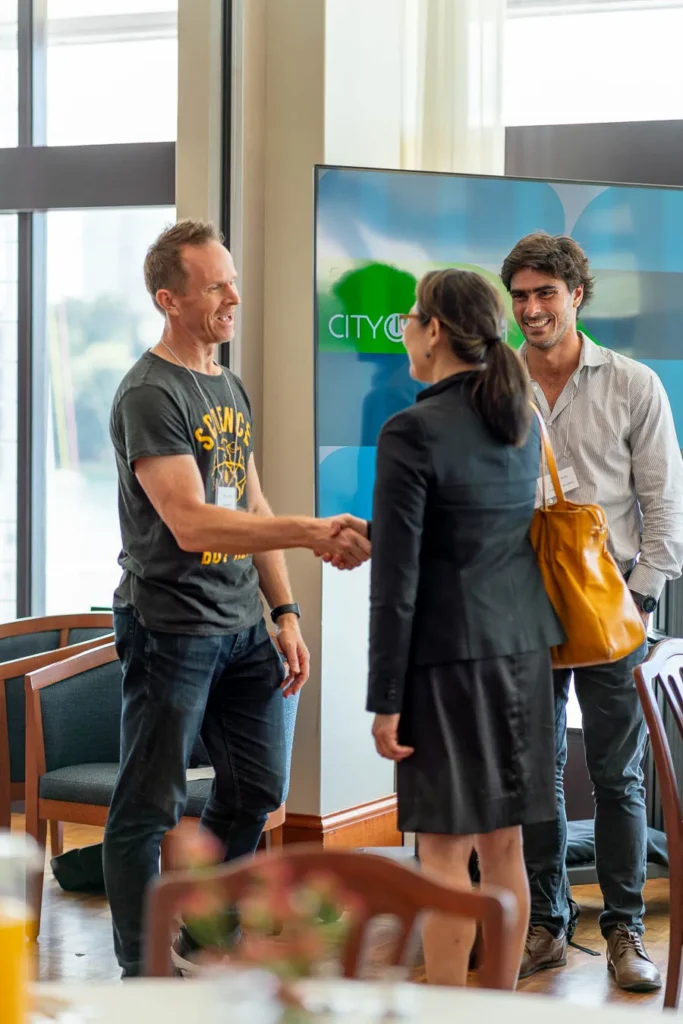 Event host welcoming guests at Royal Sydney Yacht Squadron