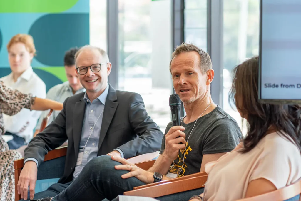 Panel speakers at CitySwitch event captured in candid moment