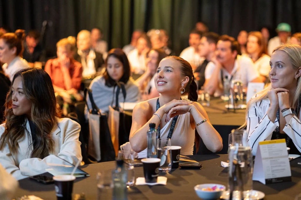 Audience listening to conference speakers