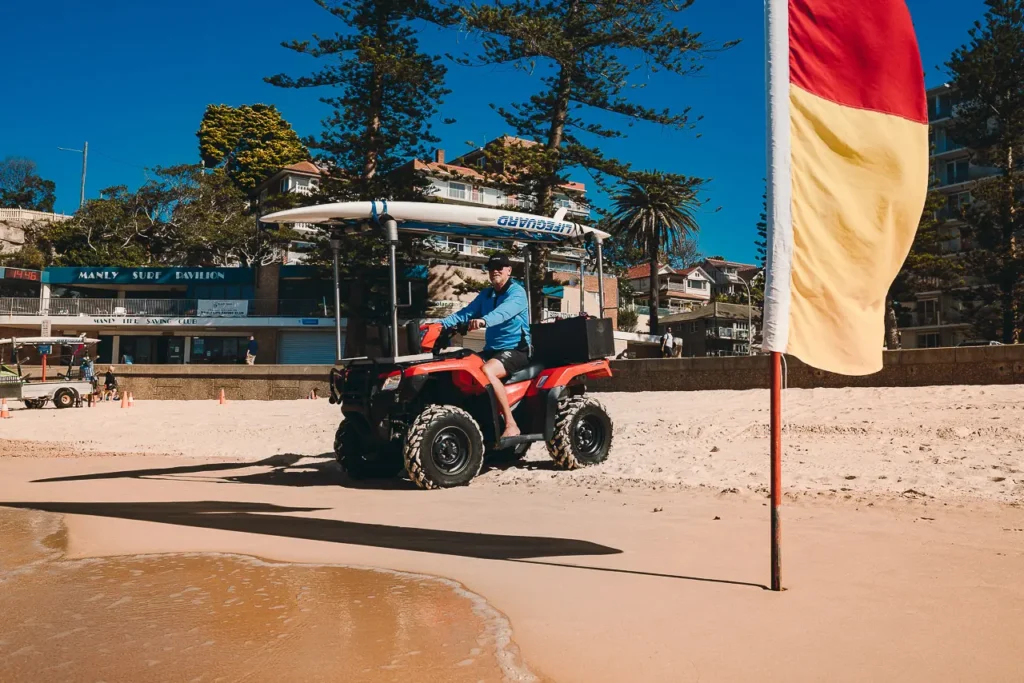 Northern Beaches beach lifeguard looking out to sea