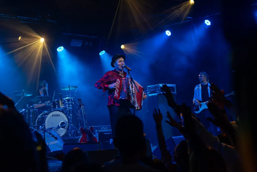 Audience reacting during live performance at Liberty Hall