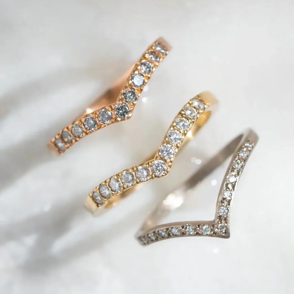 Gold diamond engagement rings photographed in studio