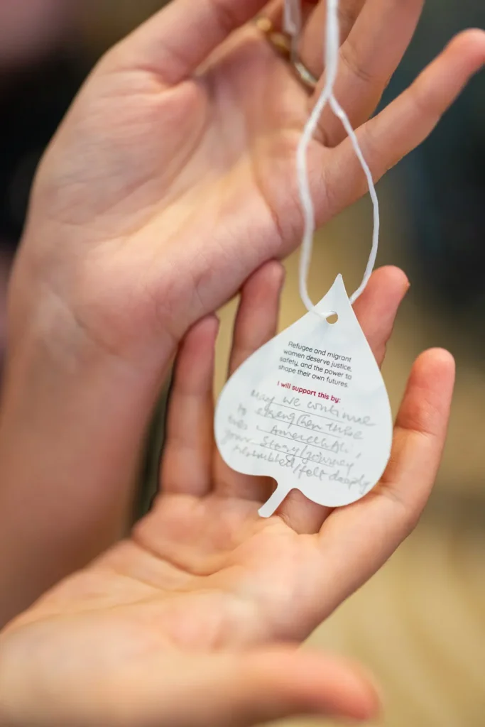 Close up of a commitment leaf written by a guest at the Silence to Power event