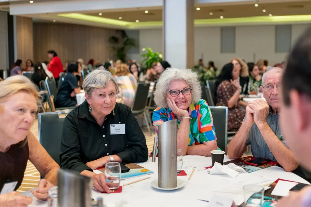 Guests seated together during discussions at the conference in Parramatta