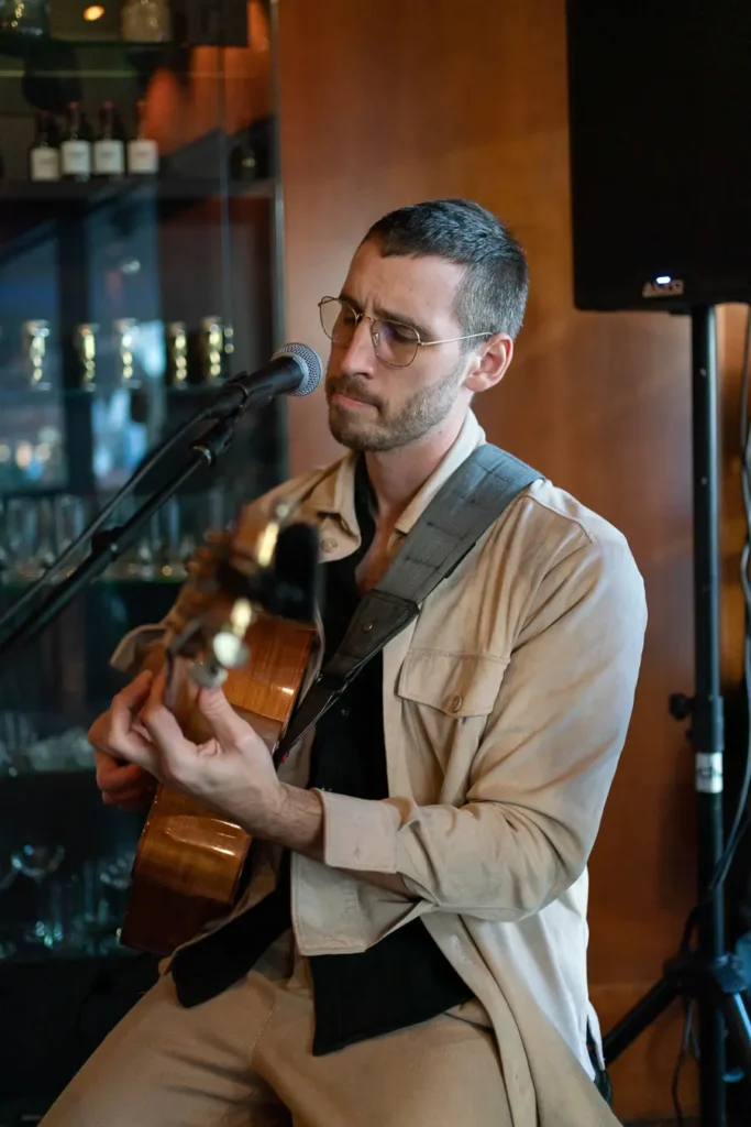 Live musician performing at the Guidewire Insurance Forum Sydney 2023 evening reception