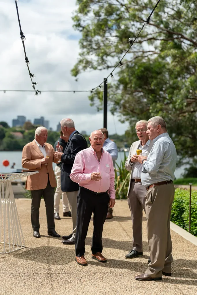 Guests greeting each other before the Michael Morgan OAM lunch at Deckhouse Woolwich