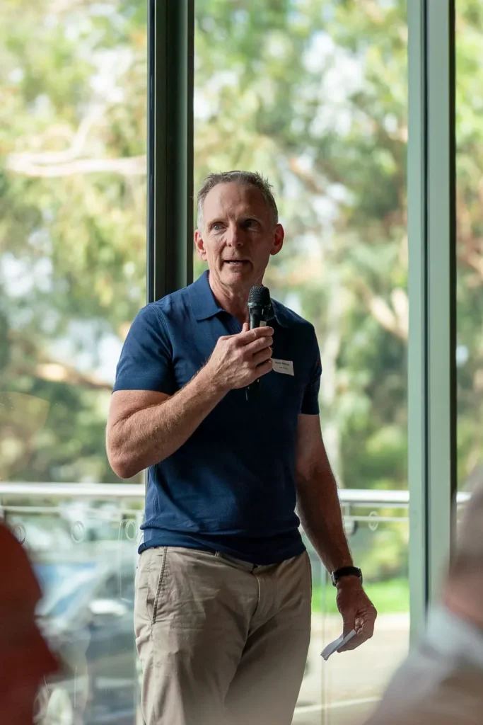 Guest speaker standing during the Michael Morgan OAM lunch at Deckhouse Woolwich
