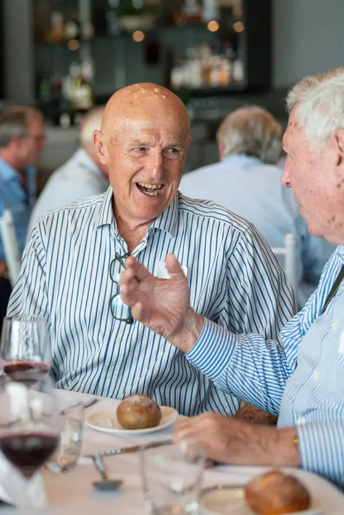 Guests chatting over lunch at the Michael Morgan OAM event