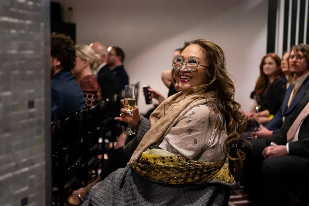 Guest smiling during the Australian Web Awards presentation