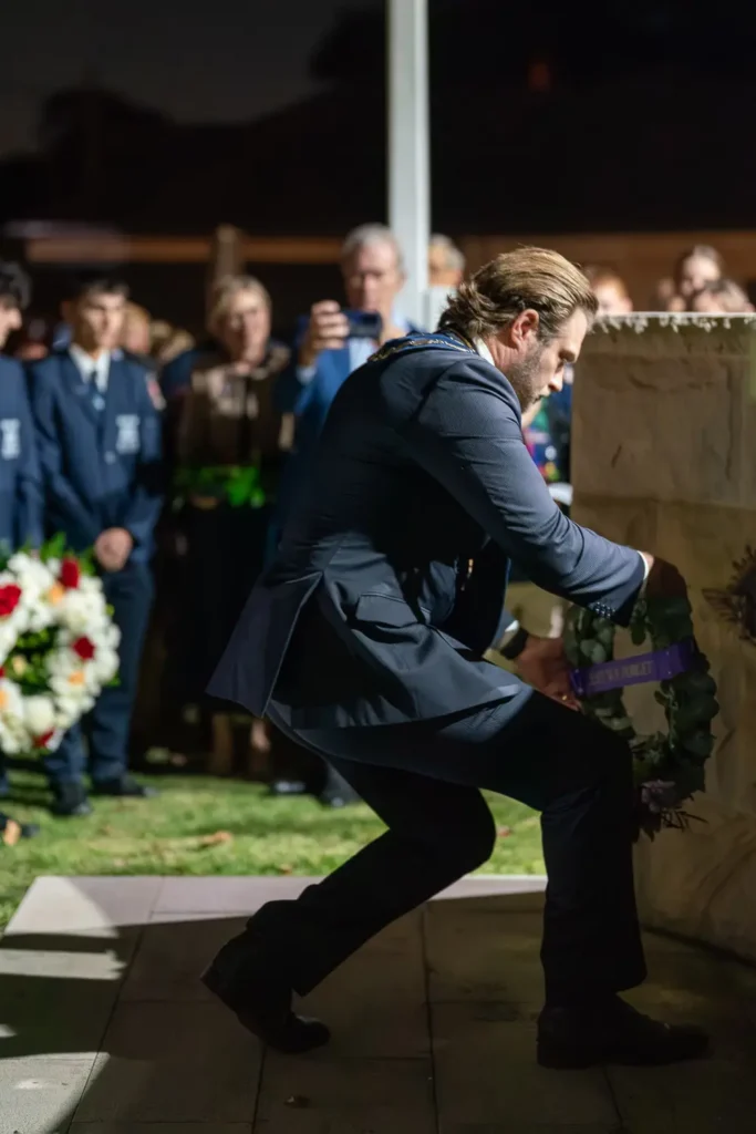 Wreath being placed at the Hunters Hill RSL Memorial Wall