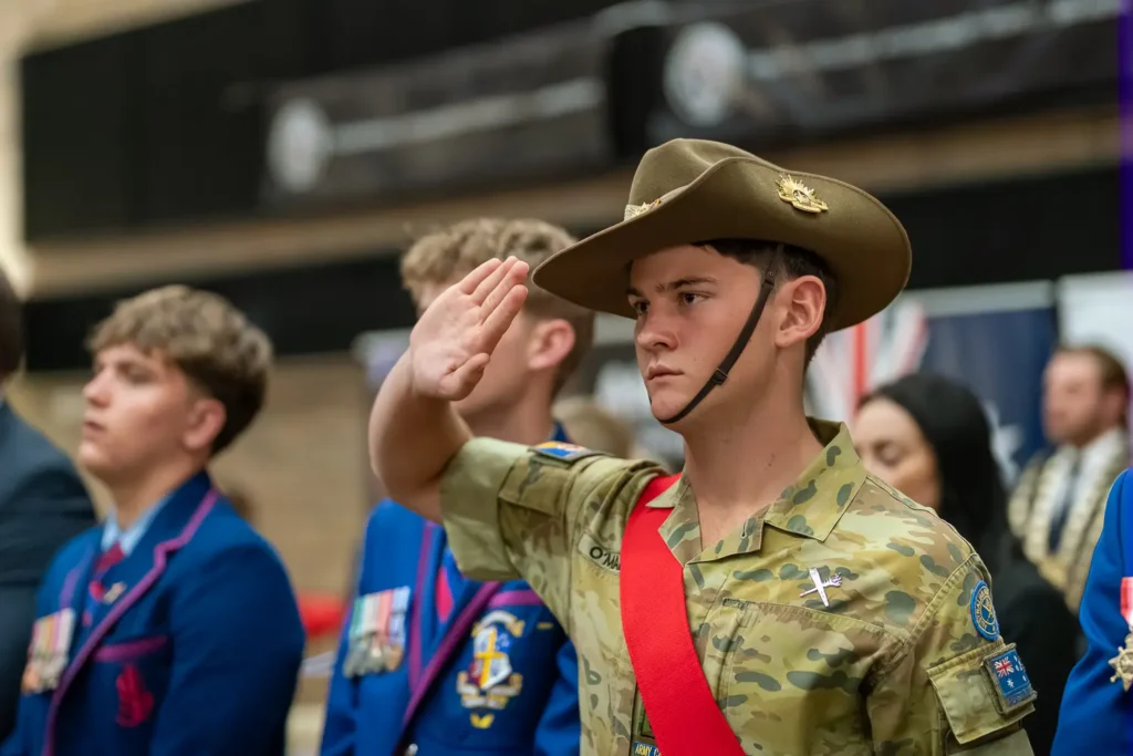 Australian Army cadet saluting during the Hunters Hill ANZAC service