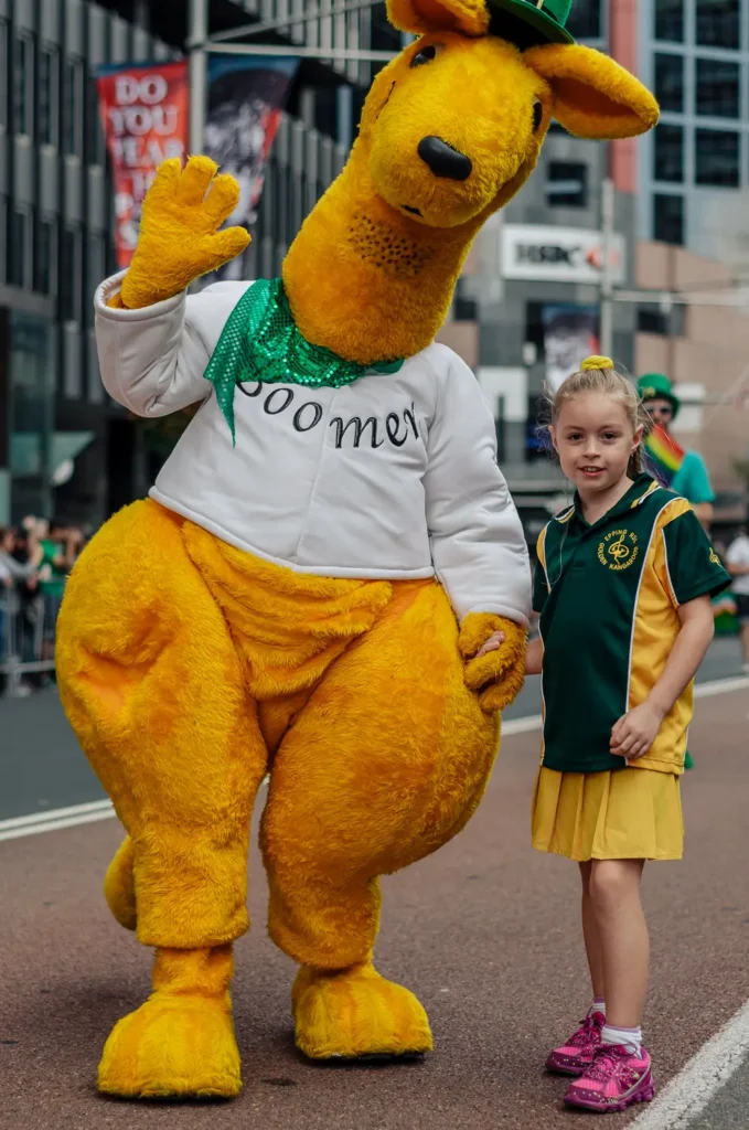 Kangaroo mascot and child at Sydney St Patrick’s Day Parade