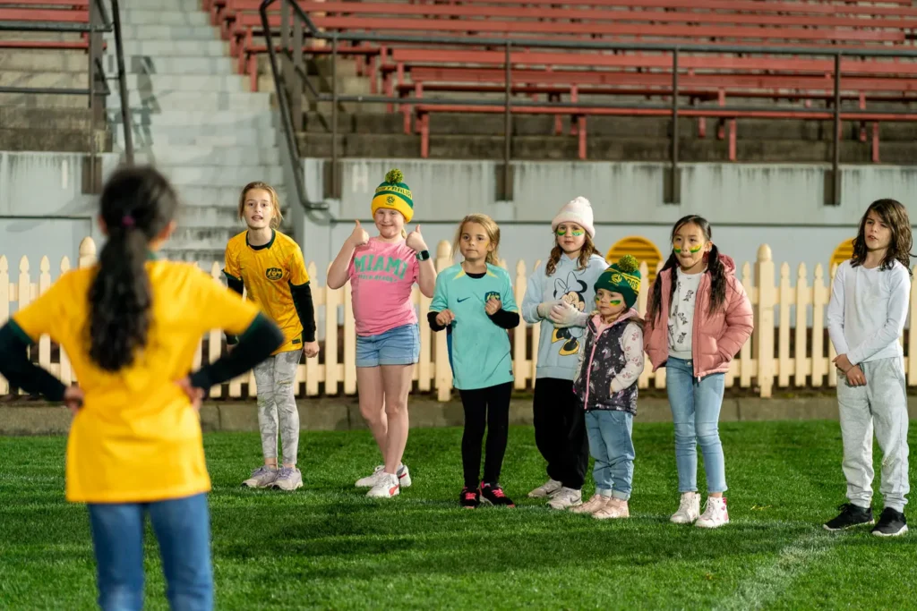 Children taking part in a Matildas themed activity at North Sydney Oval live site