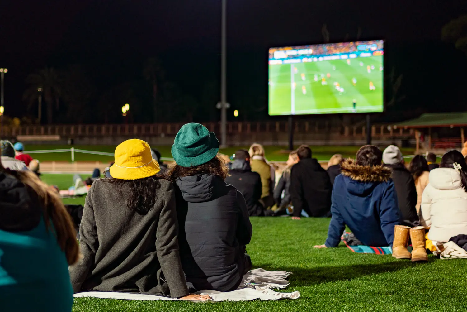 Spectators watching the Matildas match on the giant screen at North Sydney Oval