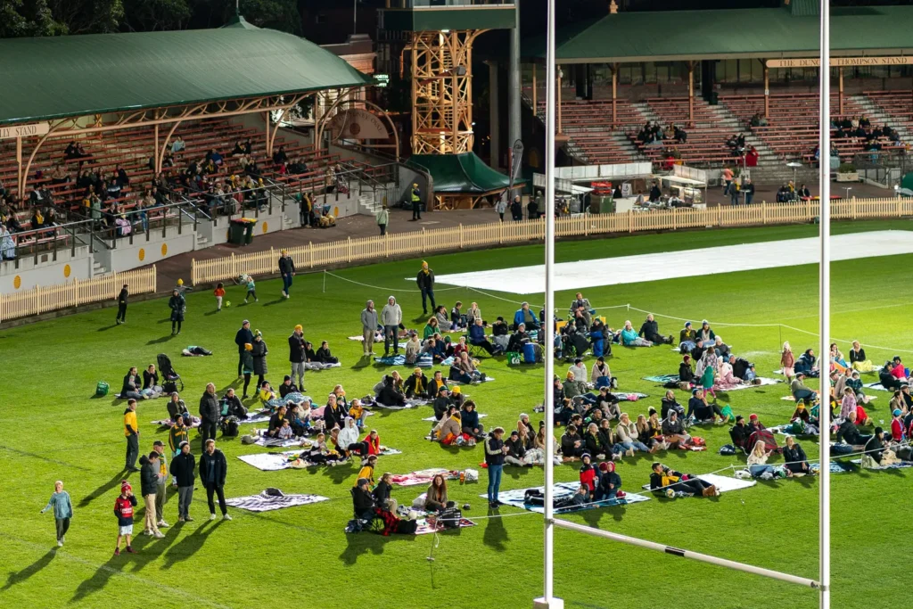 Overhead view of families enjoying the Matildas live site at North Sydney Oval