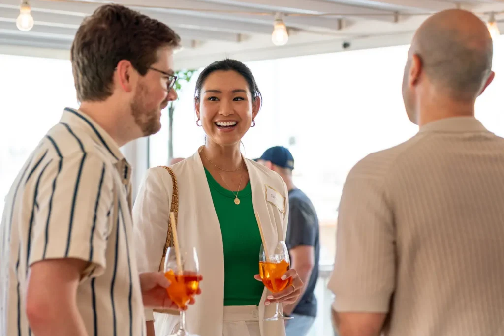 Guests enjoying cocktails at the SHIFT Soirée at The Boathouse