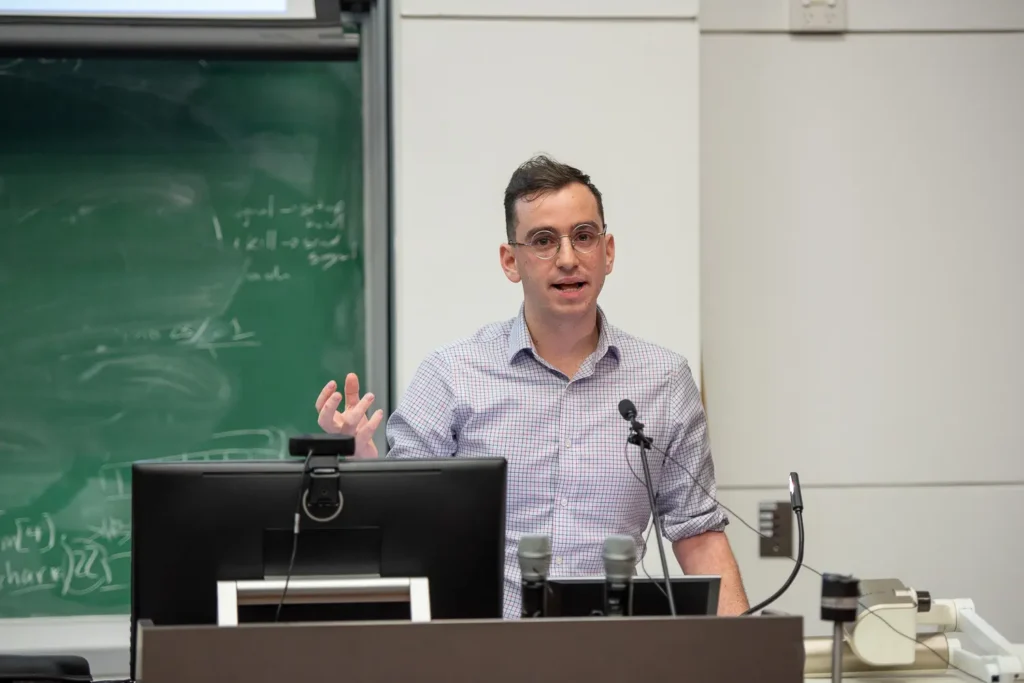 Speaker presenting an argument during the University of Sydney student debate
