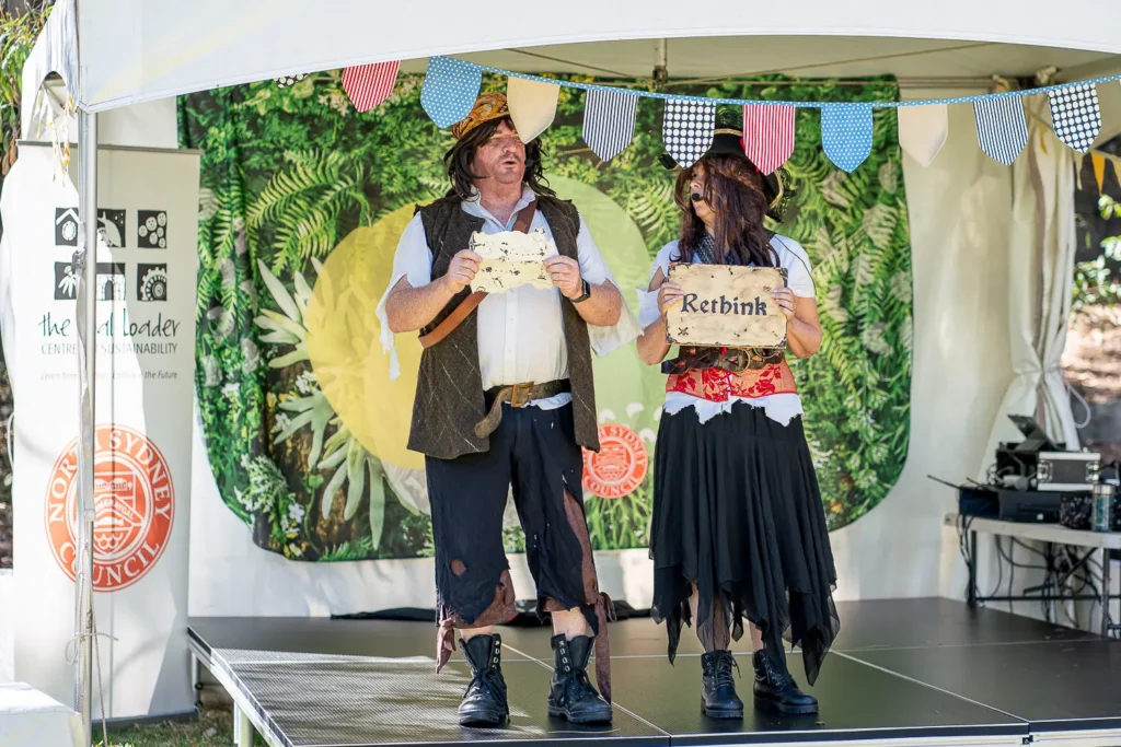 Performers on stage at the Coal Loader Sustainability Festival hosted by North Sydney Council