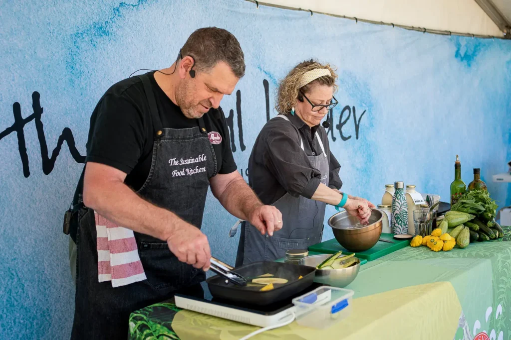 Sustainable cooking demonstration with fresh vegetables at the Coal Loader festival