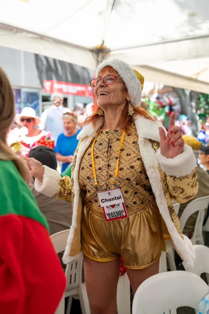 Guest dancing and celebrating at the Wayside Chapel Christmas Day event