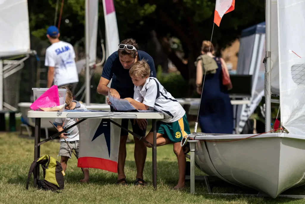 Family exploring sailing activities during a Sydney expo event
