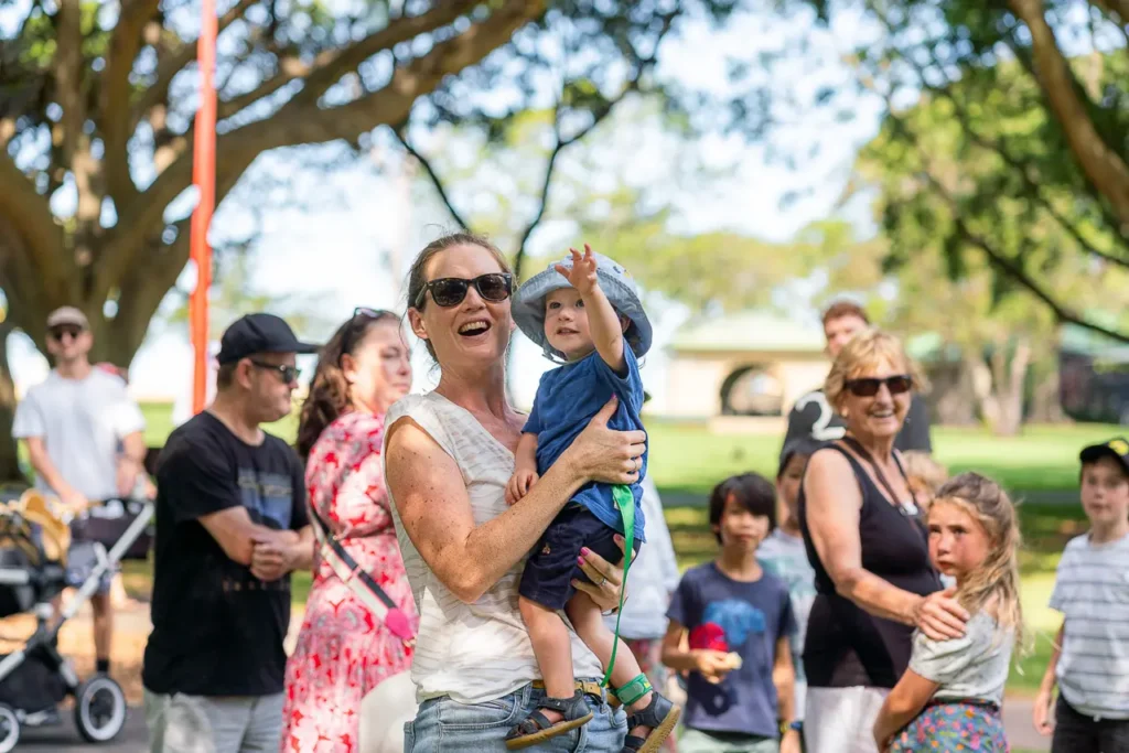 Event photography capturing local families enjoying the St Leonards Park playground opening in North Sydney