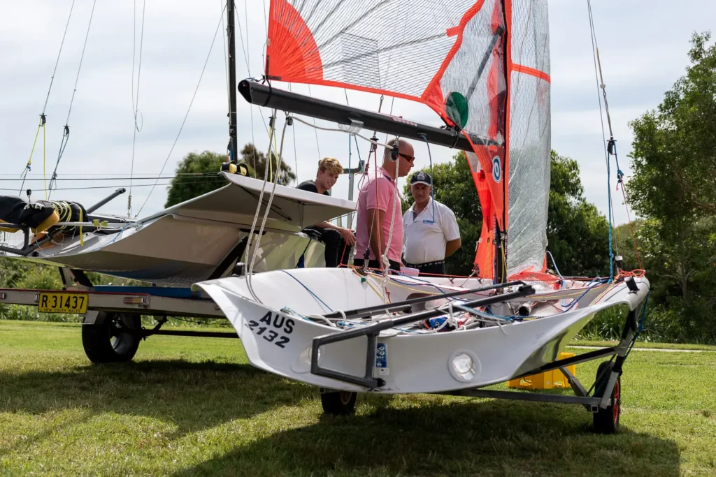 Performance sailboat and exhibitors photographed at a Sydney sailing expo