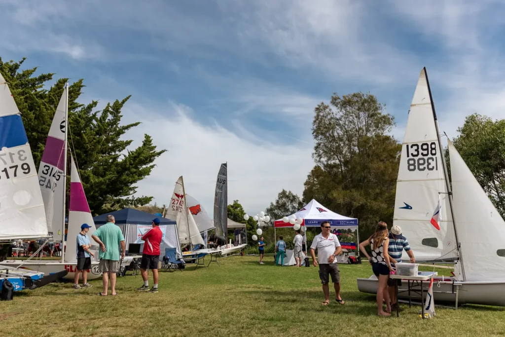 Wide view of sailboats and exhibition stands at a Sydney sailing expo