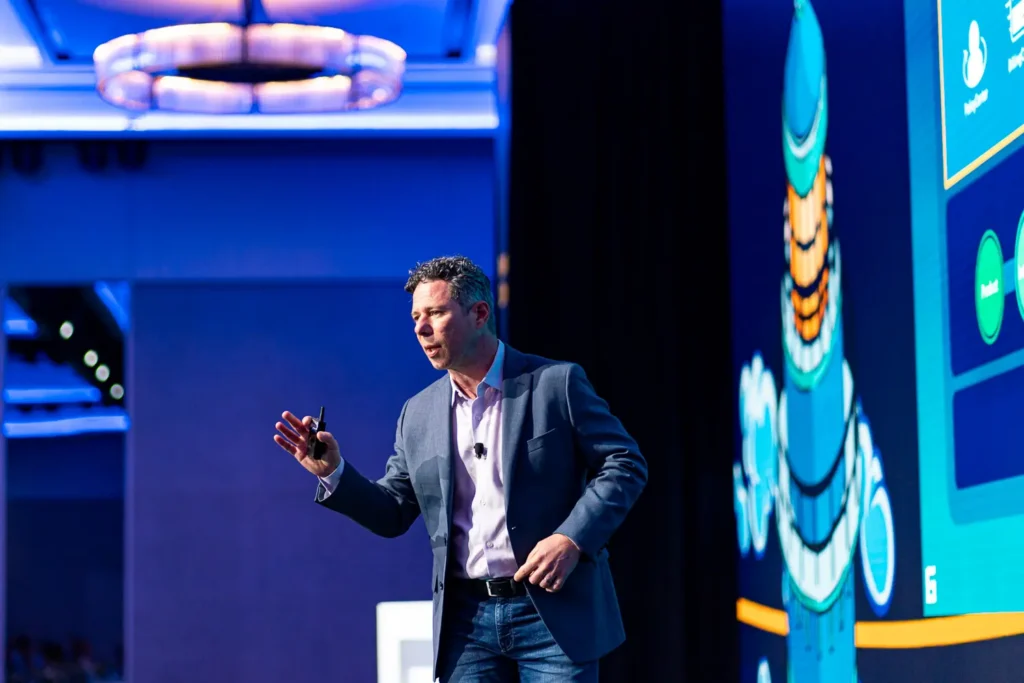Corporate conference speaker photographed at Guidewire Insurance Forum Sydney
