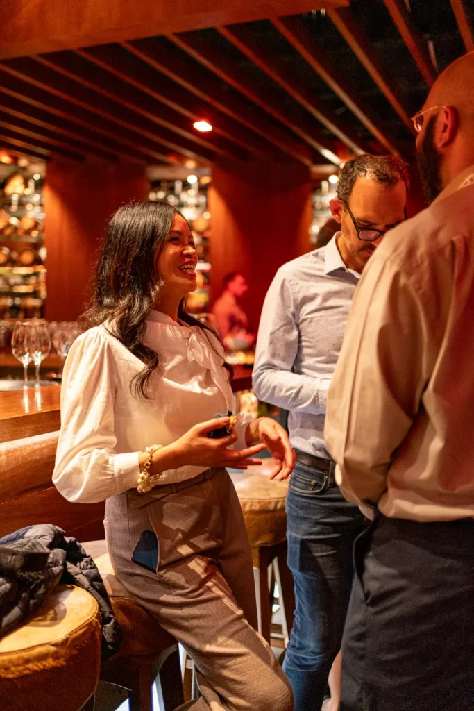 Guests socialising at a corporate event at Grain Bar, Four Seasons Hotel Sydney