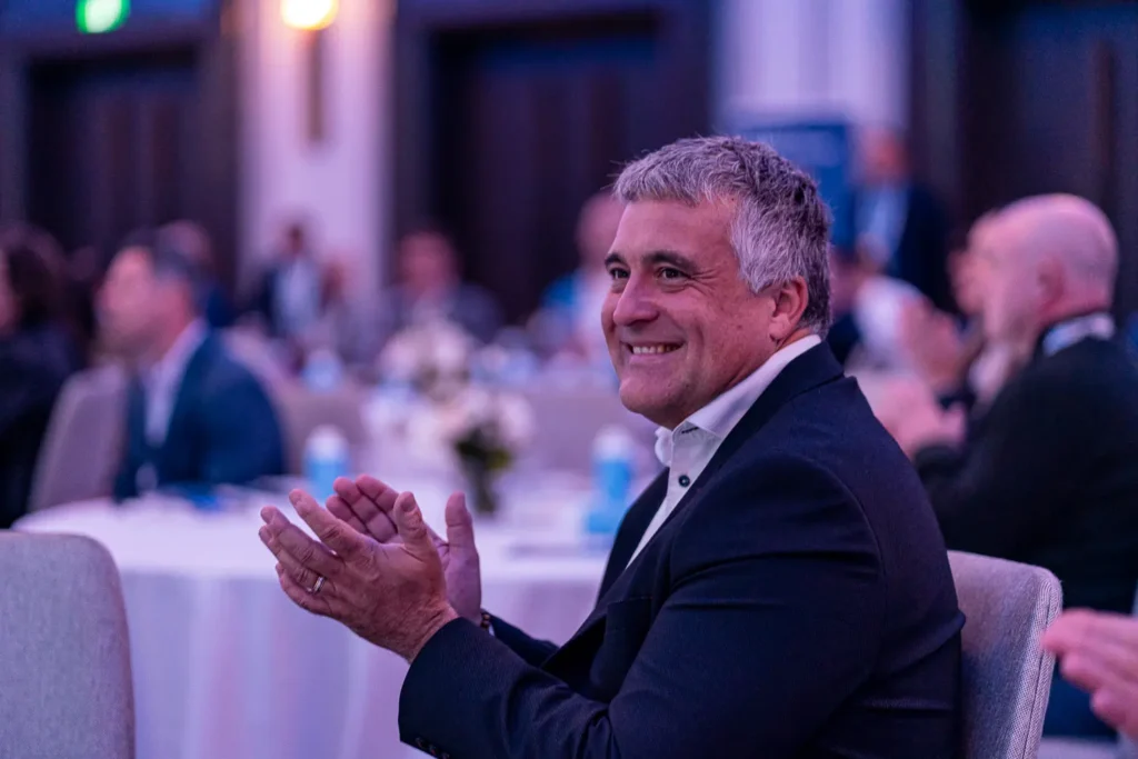 Audience applauding a presentation at Guidewire Insurance Forum Sydney 2024