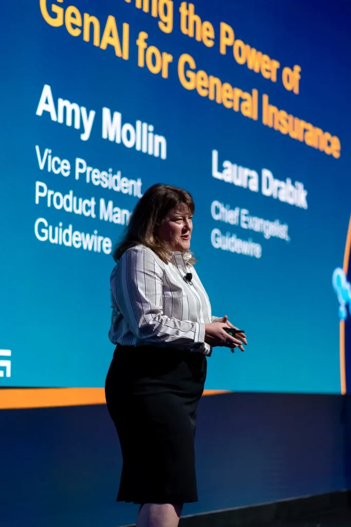 Guidewire speaker presenting on stage at Four Seasons Hotel Sydney
