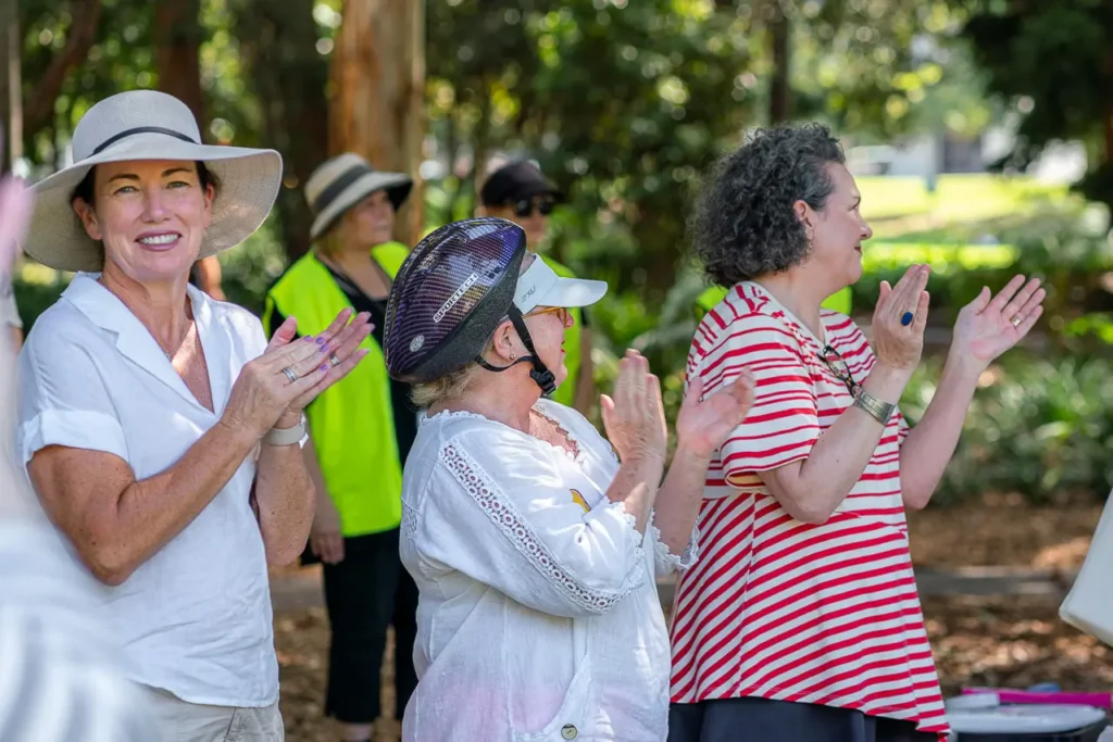 Community event photography capturing guests applauding at the St Leonards Park opening in North Sydney