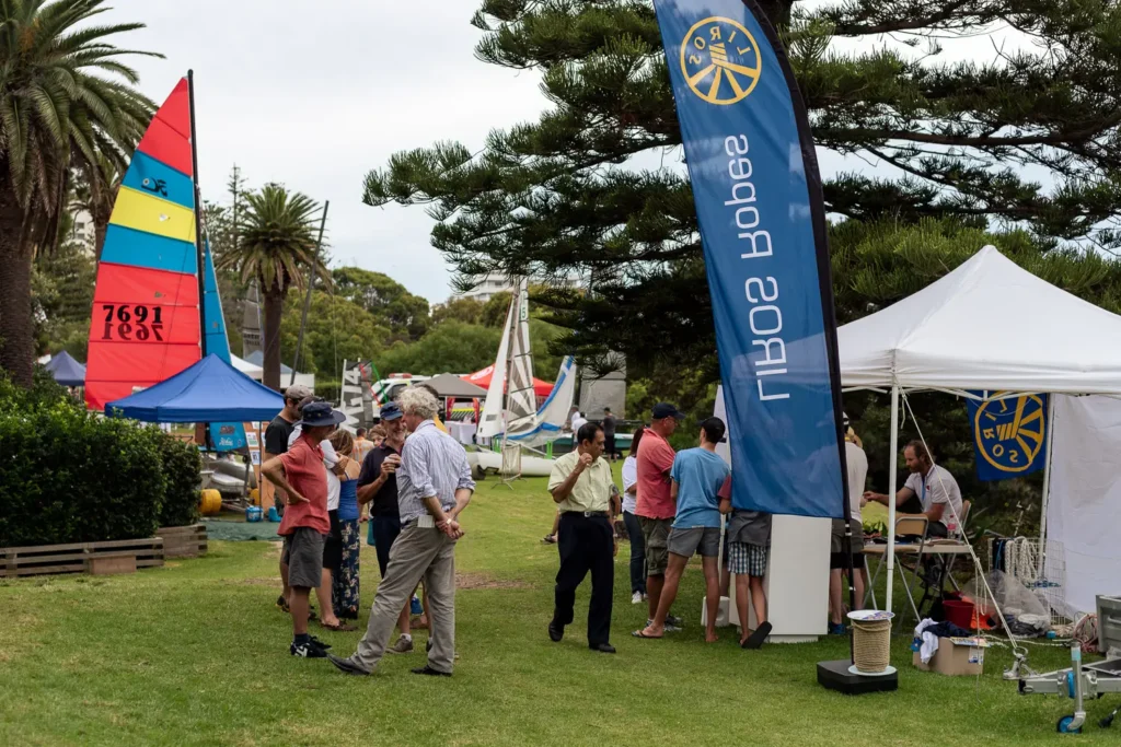 Exhibitors and visitors among sailing displays photographed at a Sydney expo event