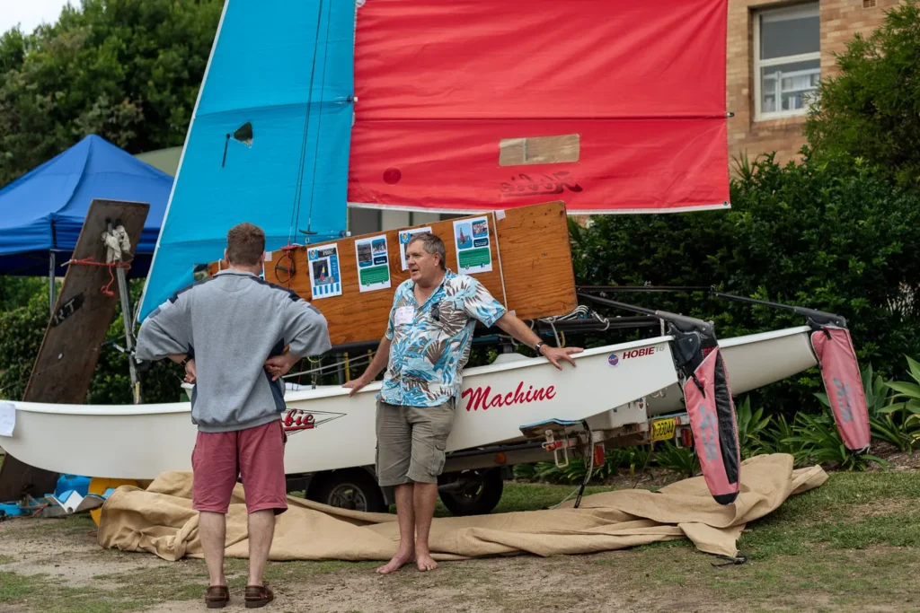 Hobie catamaran exhibit with attendees photographed at a Sydney sailing expo event