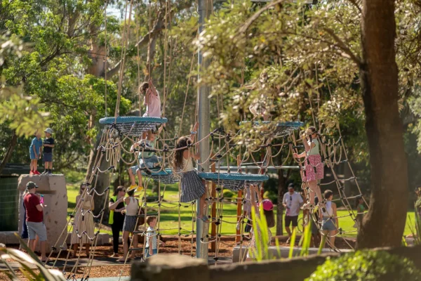 Event photography showing children exploring the climbing playground at St Leonards Park in North Sydney