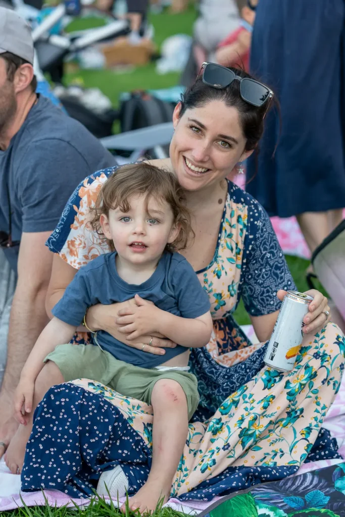 Mother and young child enjoying a picnic at North Sydney Sunset Series 2022