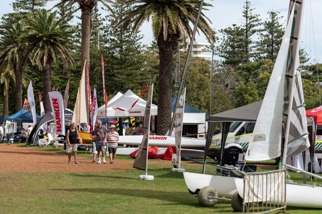 Sailboats, exhibitors and visitors at the Sydney Sailboat Expo in Manly