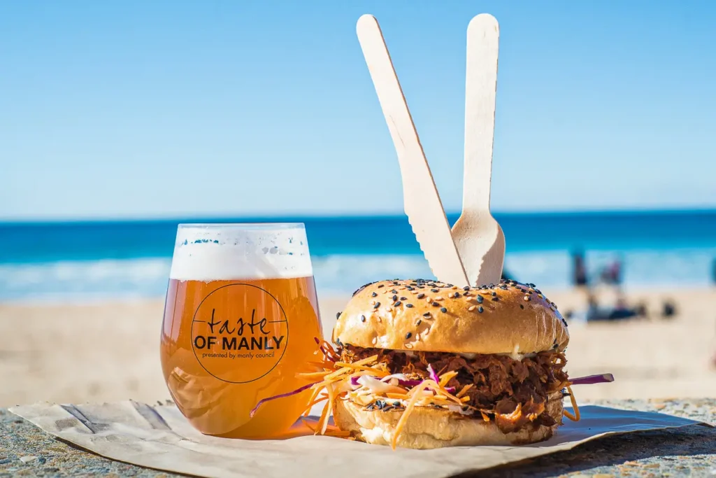 Pulled meat burger and craft beer served beside Manly Beach