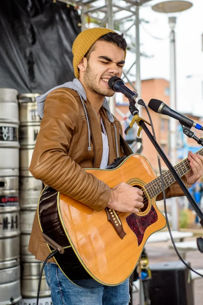 Acoustic guitarist performing live at Taste of Manly