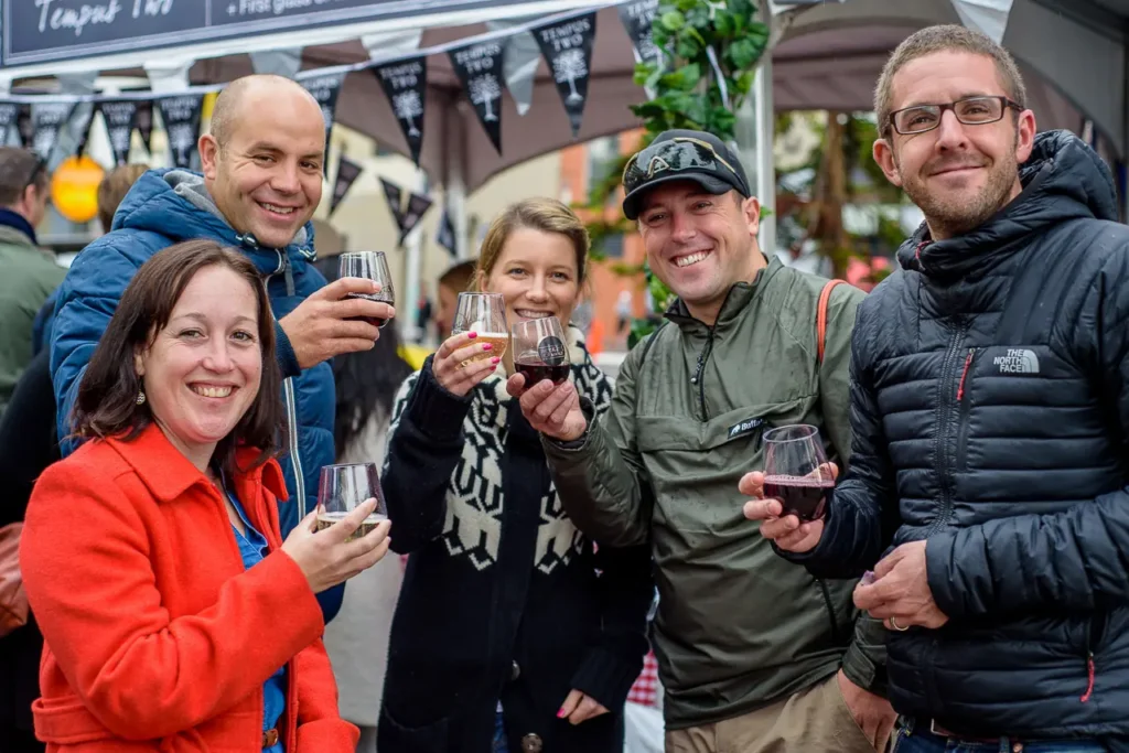 Friends enjoying regional wine at Taste of Manly festival