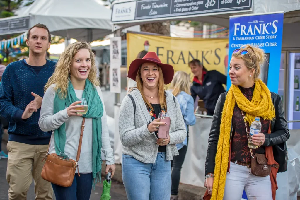Visitors enjoying drinks and food stalls at the Taste of Manly festival