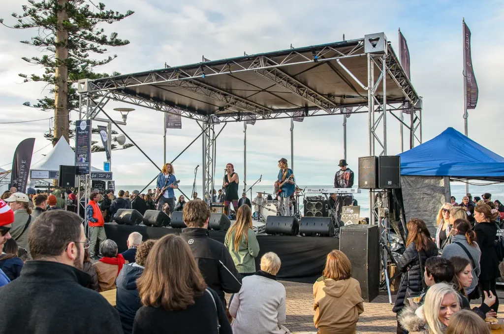 Live band performing on the outdoor stage at the Taste of Manly festival
