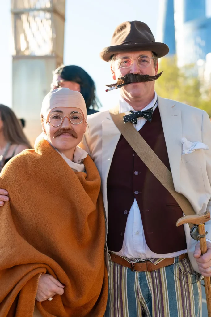 Guests in vintage costumes and fake moustaches at a Sydney corporate event